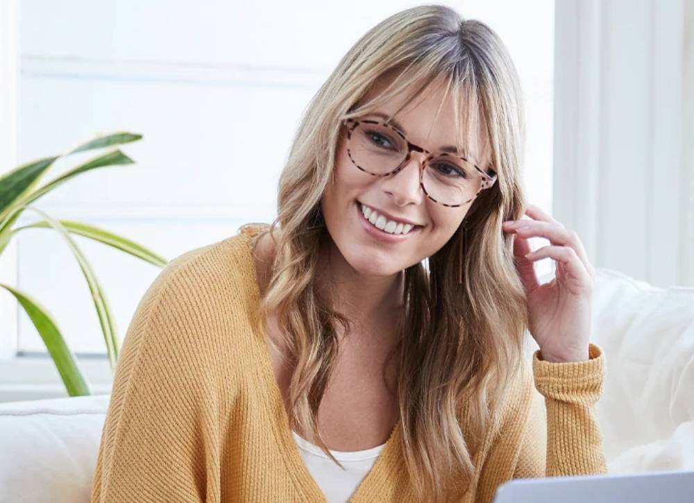 does wearing glasses improve eyesight